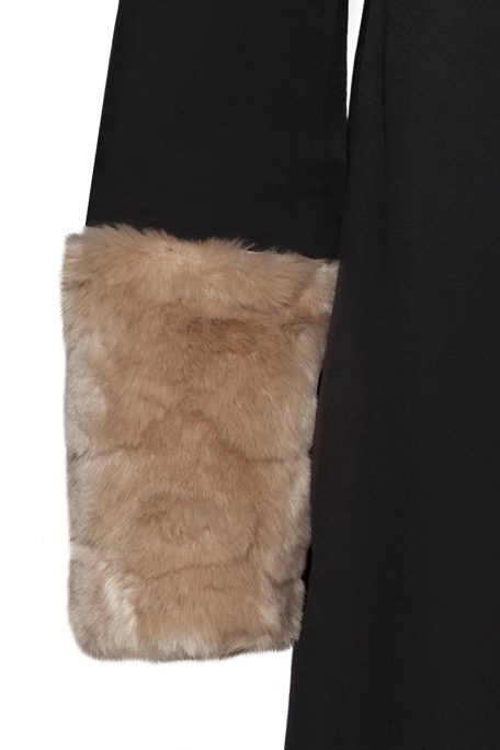 A smart coat with detachable beige faux fur sleeves - front view.