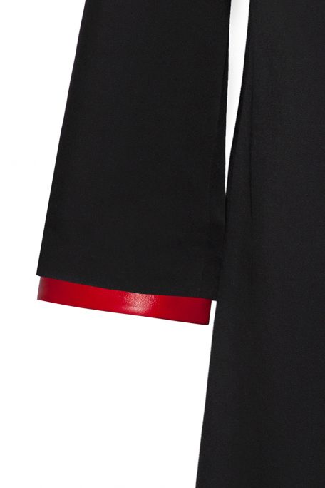 A smart coat with detachable red leather sleeves decoration - front view.