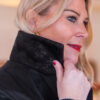 Smart womans coat with a suede leather collar