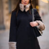 The Emilia trasformer coat with beige fur sleeves and collar